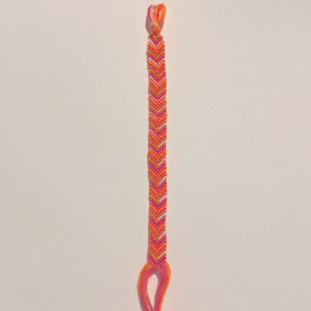 Hand Crafted String Bracelet Warm Colors Very interesting Design